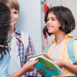 pupils-talking-in-school-next-to-school-lockers.jpg